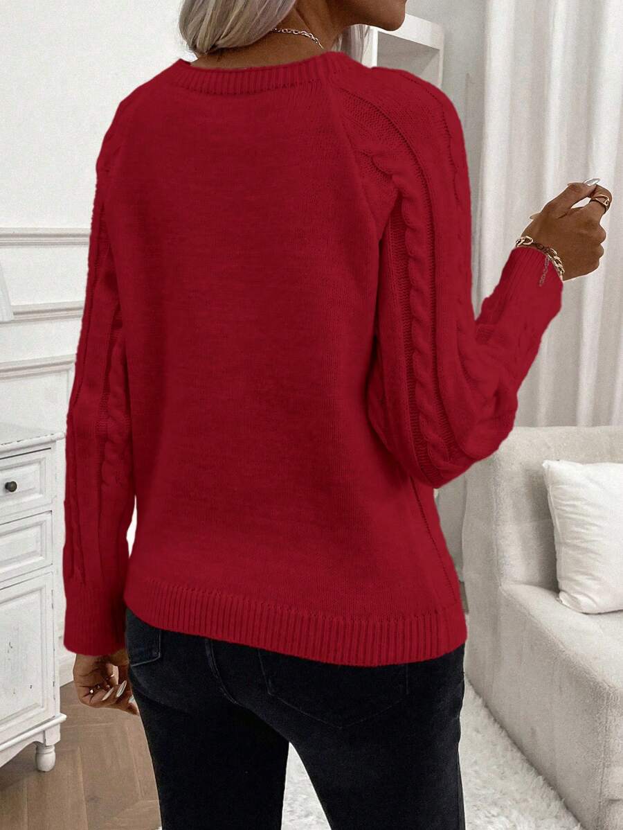 Clara – Suéter con detalles de botones y patrón lujoso