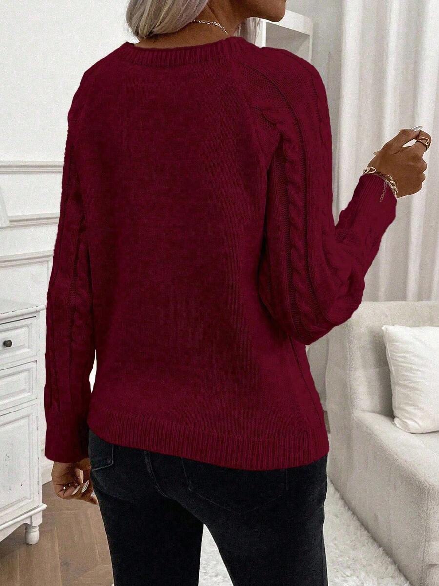 Clara – Suéter con detalles de botones y patrón lujoso