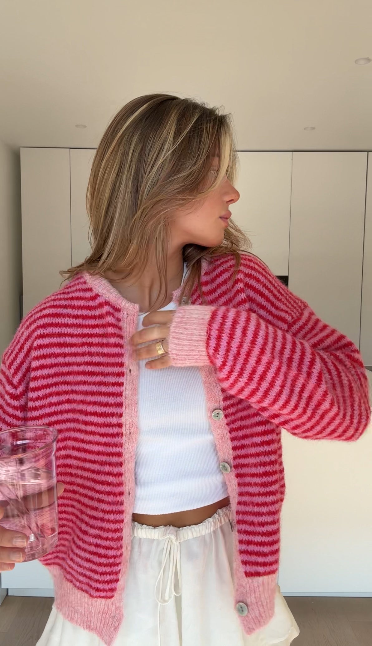 Cárdigan de rayas suave rosa
