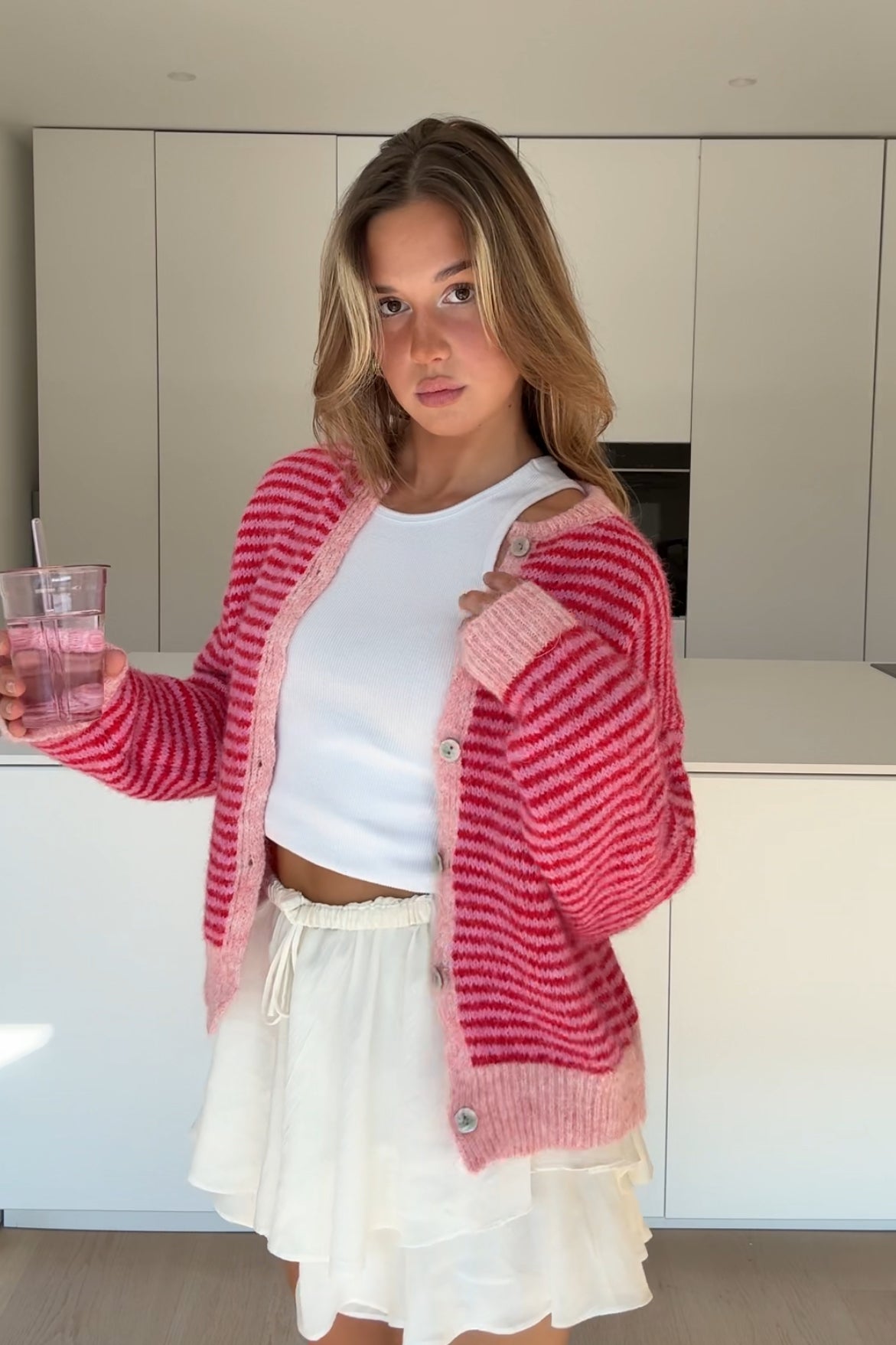 Cárdigan de rayas suave rosa