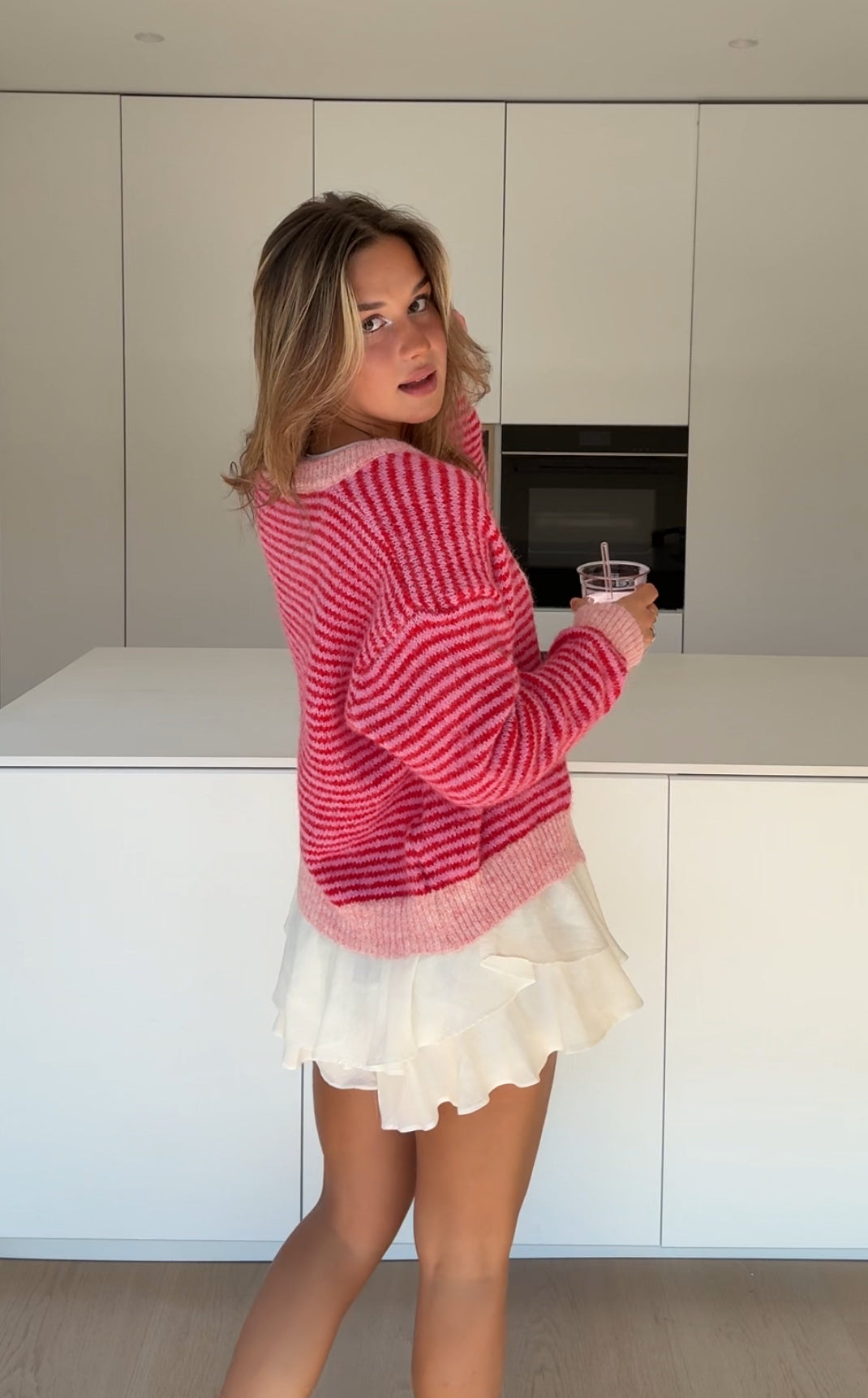 Cárdigan de rayas suave rosa