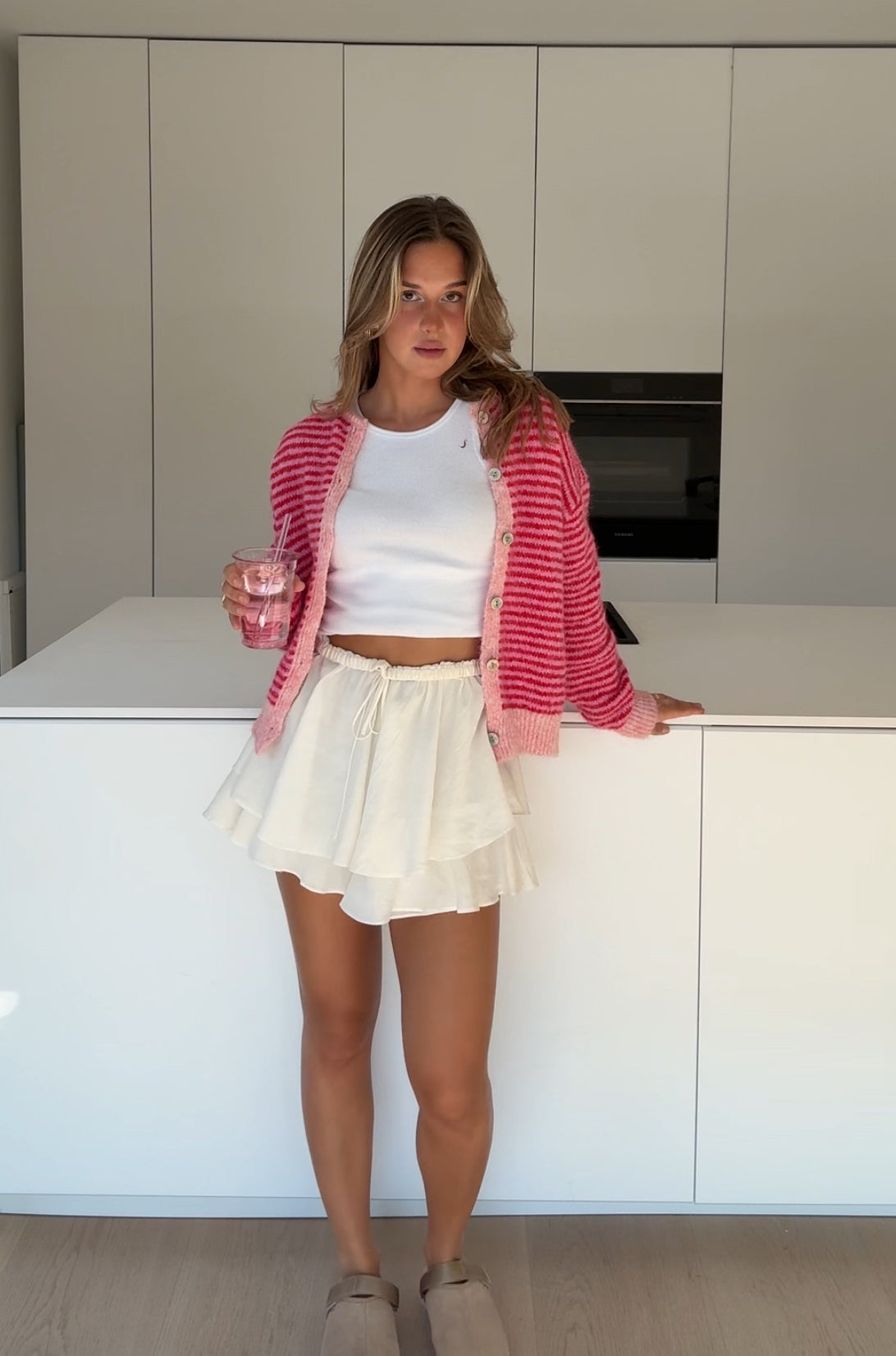 Cárdigan de rayas suave rosa