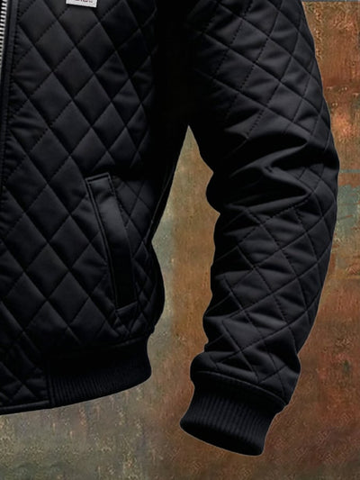 Adrian | Chaqueta acolchada negra con hombreras de cuero